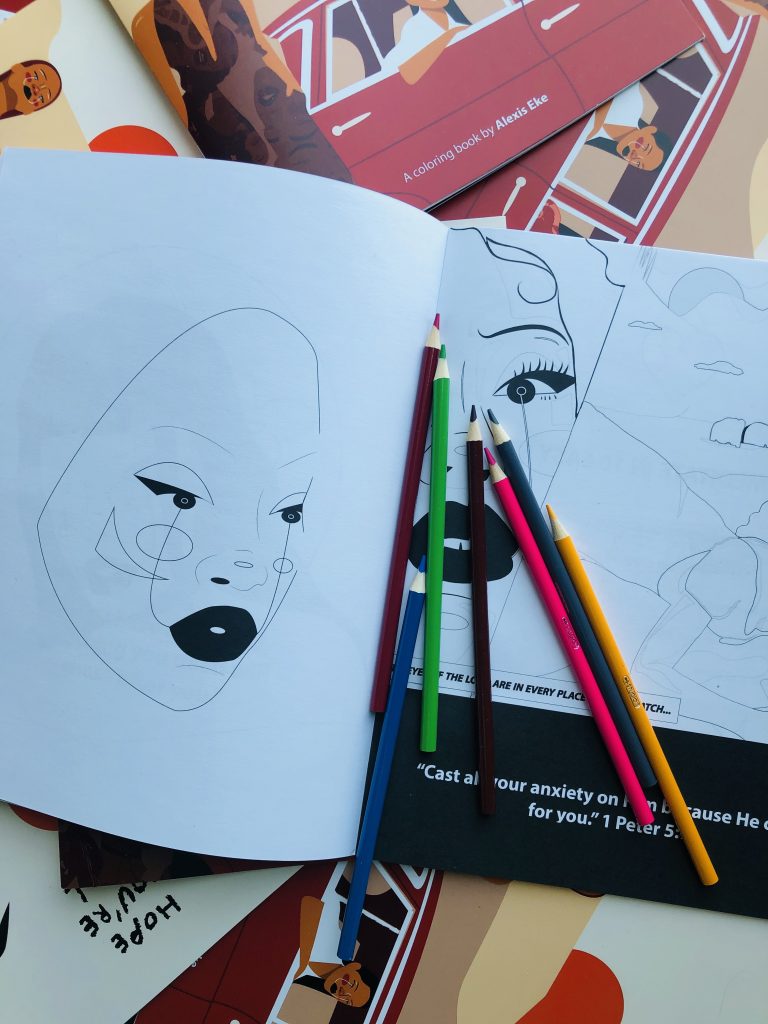 Drawings of Black women in colouring book